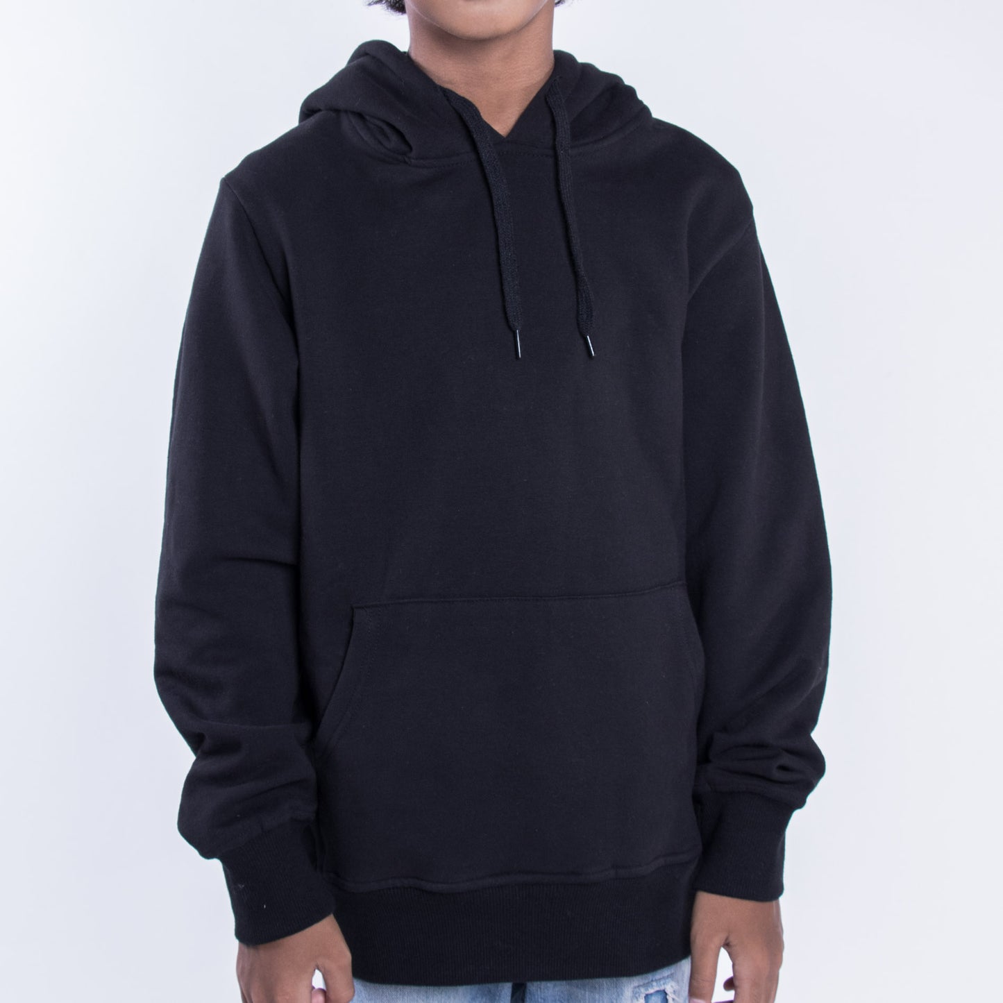 Kids premium cotton hoodie in black KUD425 on model front view